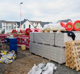 Verputzermaschine, Steinwolle und Rigipsplatten