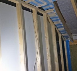 Fermacellwand Bilbiothek vom Treppenhaus aus