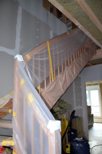 Treppe mit Schutzfolie und -decken