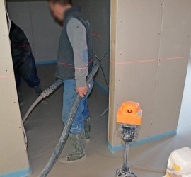 Estrichverlegung mit Laser in der Ankleide