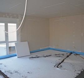 Wohnzimmer: Fußbodenheizungsstyropor mit Schüttung